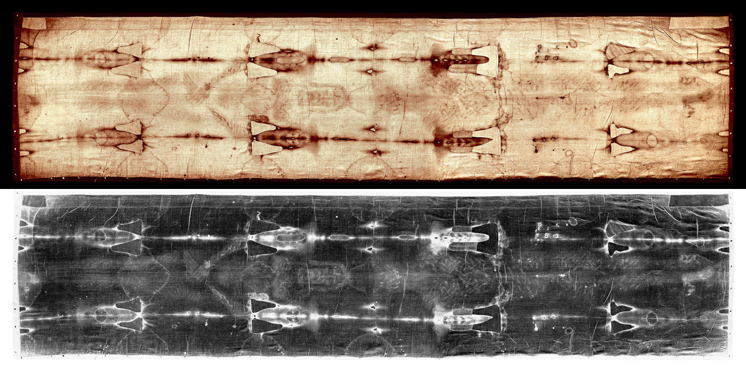 The image is a black and white photograph of a textured surface, possibly a piece of fabric or paper, with a repeating pattern of shapes or designs.