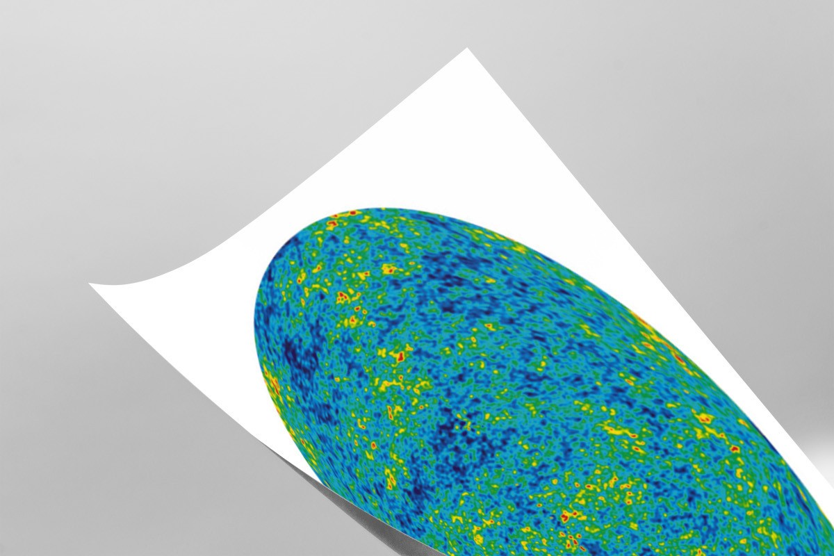 The image is a collage of various images, including a white paper with a colorful, abstract pattern on it.