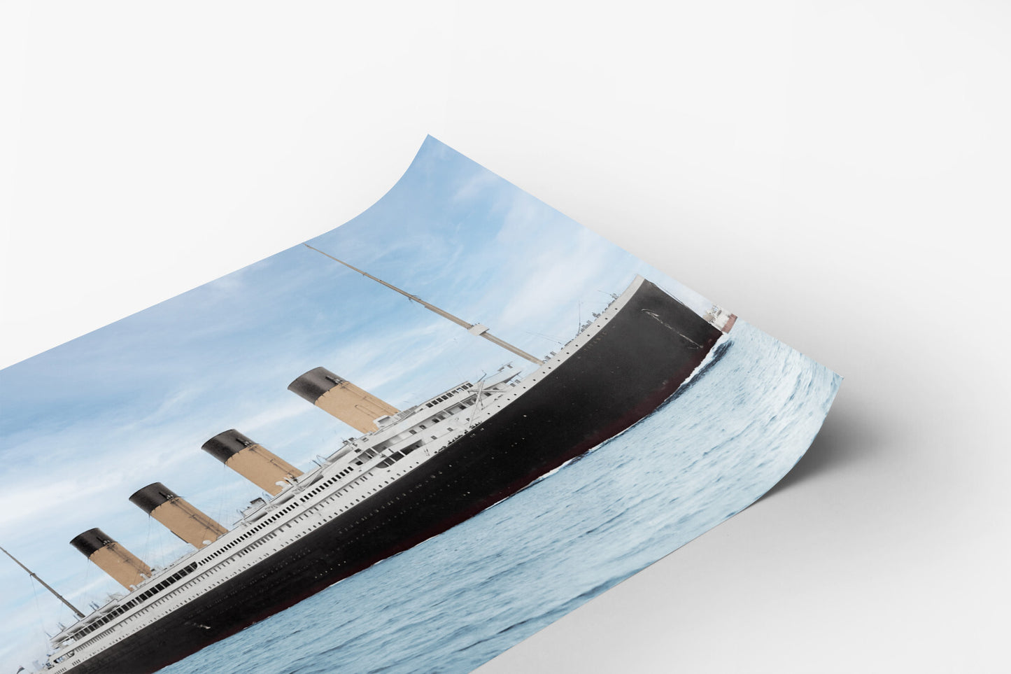 A photograph of the iconic Titanic ship, the RMS Titanic, sailing on the open ocean.