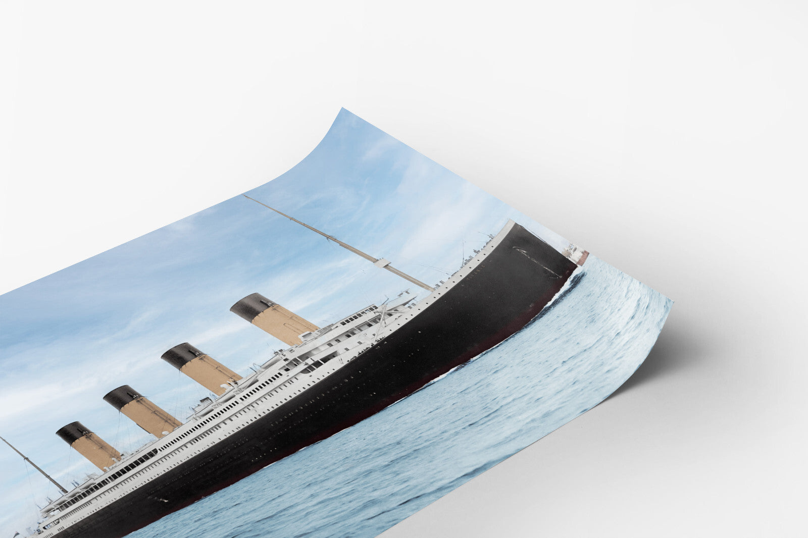 A photograph of the iconic Titanic ship, the RMS Titanic, sailing on the open ocean.