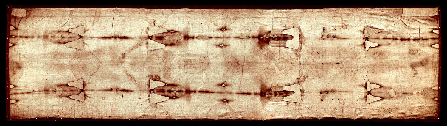 The image is a sepia-toned photograph of a textured fabric with a repeating pattern of shapes and lines.